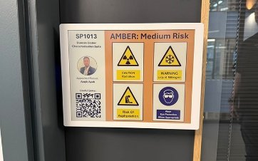 wall-mounted signage next to a door